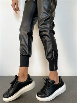 Siyah  Paçası Lastik ve Fermuar Detaylı Tasarım Deri Pantolon